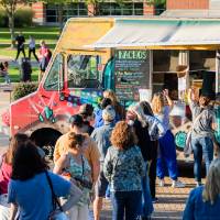 People lining up at Righteous Cuisine food truck.